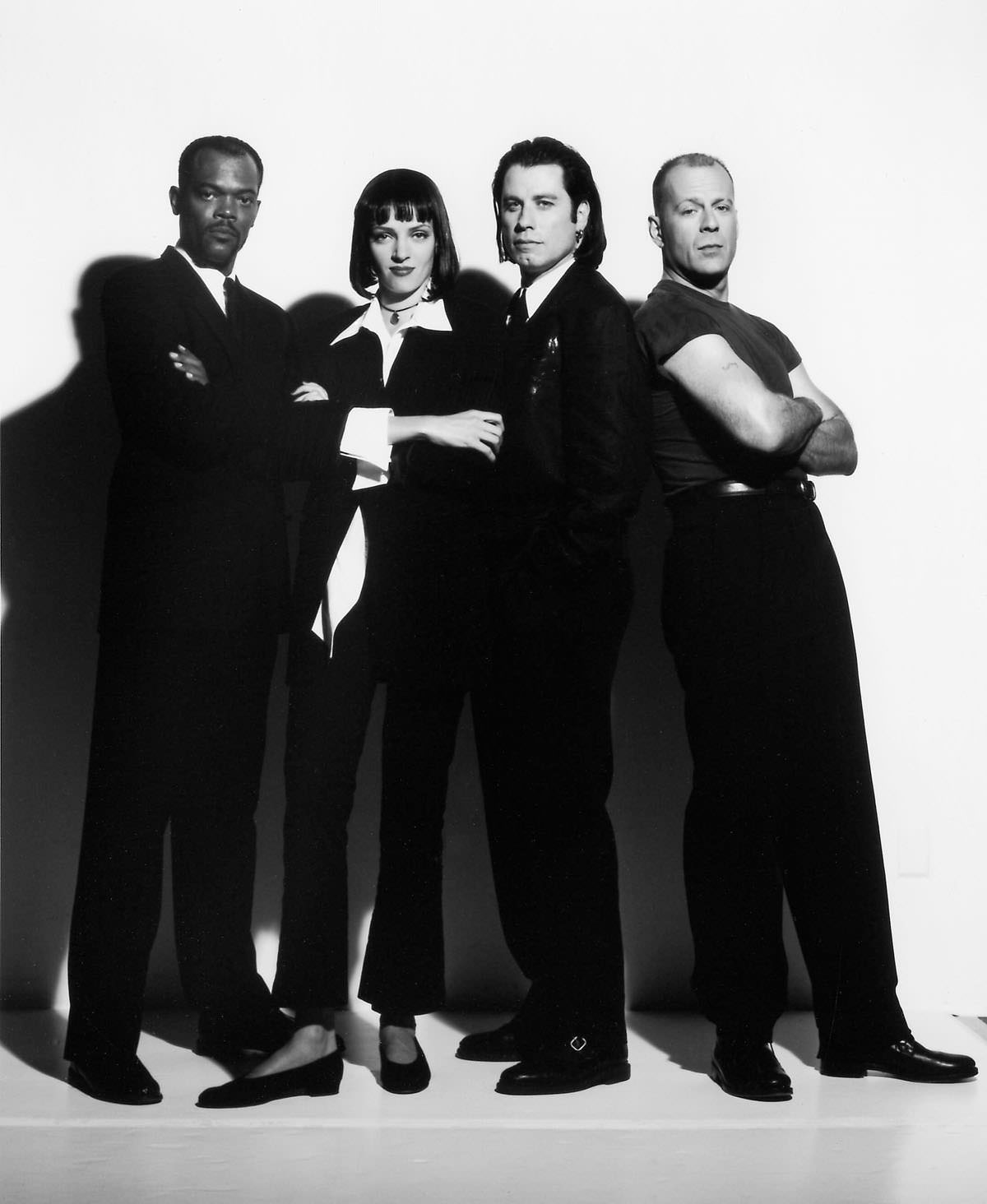 Samuel L. Jackson, Uma Thurman, John Travolta, and Bruce Willis as they appear in PULP FICTION, 1994.