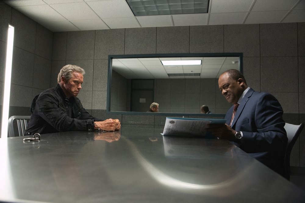 Left to right: Arnold Schwarzenegger plays the Terminator and Gregory Alan Williams plays Detective Harding in Terminator Genisys from Paramount Pictures and Skydance Productions.