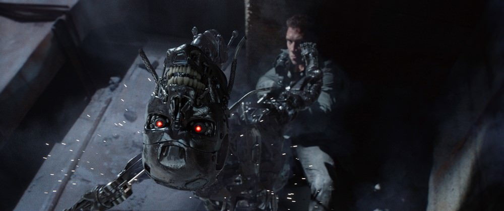 Left to right: Series T-800 Robot and Jai Courtney plays Kyle Reese in Terminator Genisys from Paramount Pictures and Skydance Productions.